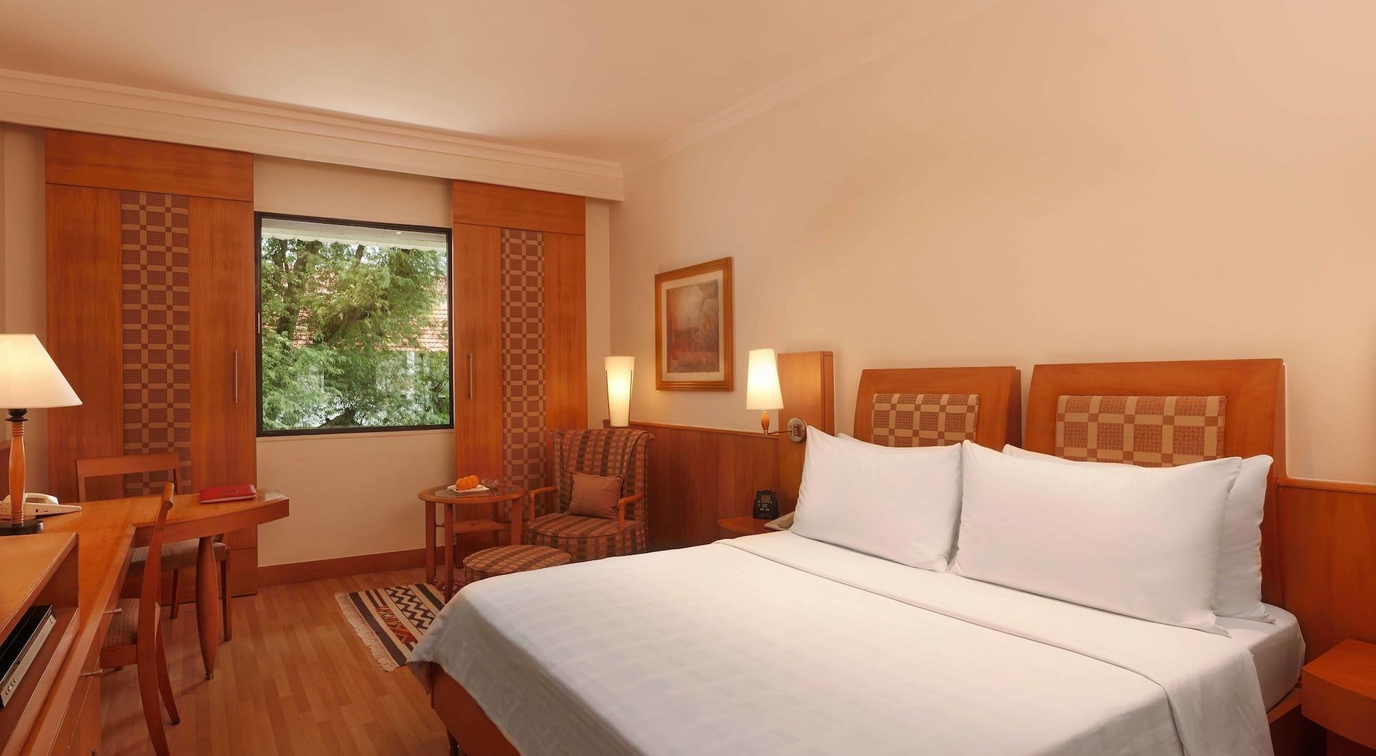 Trident Chennai Exterior foto A room at the Taj Bengal